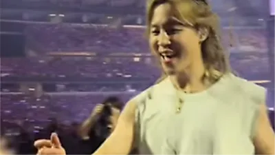 Jimin [BTS] moves fans with kiss to young girl battling cancer