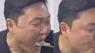 Psy devours Busan pork soup, jokes about newfound jawline