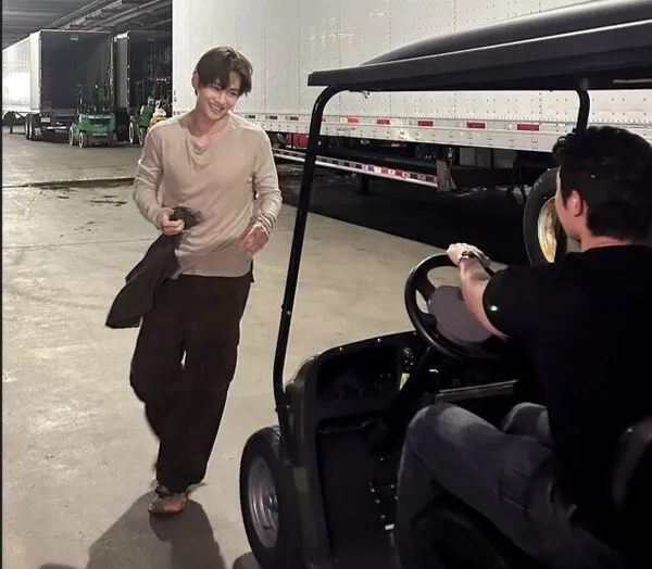 BTS V hitchhikes on RM's electric car backstage