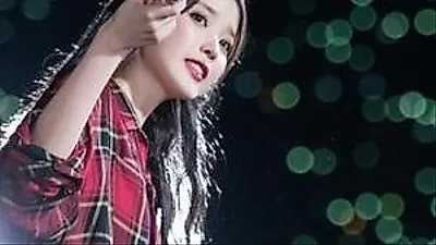 IU visits theaters despite health issues to meet fans
