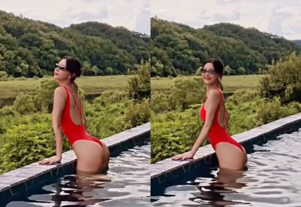 Clara stuns in bright red swimsuit, showcasing overwhelming proportions: "A pictorial in every shot"
