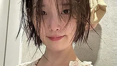 IU showcases transformation from bare face to full makeup