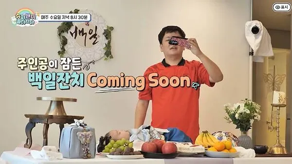 “Mom would faint if she saw this” Kwaktube flustered as son falls asleep on 100th-day celebration table