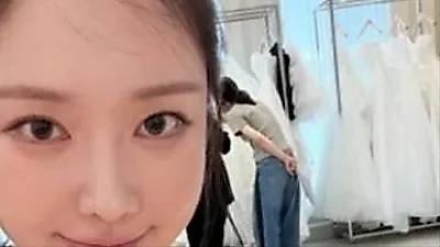 BBGIRLS Min-yeong stuns in wedding dress behind-the-scenes shots