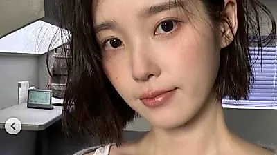 IU debuts short hair, signaling new era with 'From This Star'