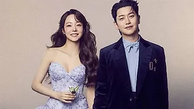 Noel's Kang Kyun-sung and Yu Ha-jin reveal romantic wedding photos
