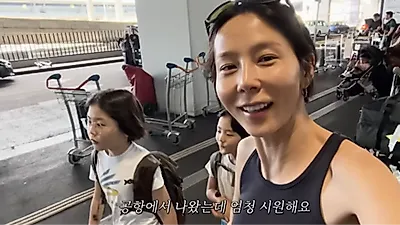 Kim Na-young enjoys cool weather in long sleeves despite Europe's deadly heatwave