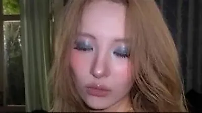 Sunmi stuns with bold see-through illusion look in new MV photos