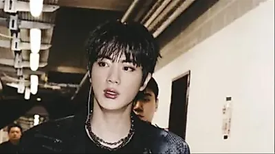 BTS Jin Captivates Fans with Sculpted Visuals at Brussels Performance