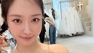 BBGIRLS Min-yeong stuns in wedding dress behind-the-scenes shots
