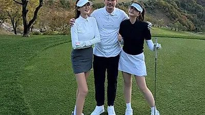 Ahn Ri-won draws attention with mature look during family golf outing