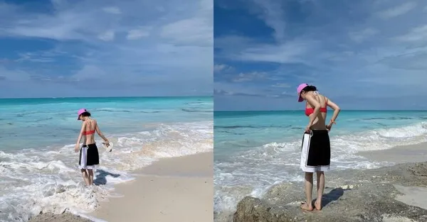 aespa Karina身着红色沙滩装，与小猪共赴海边散步